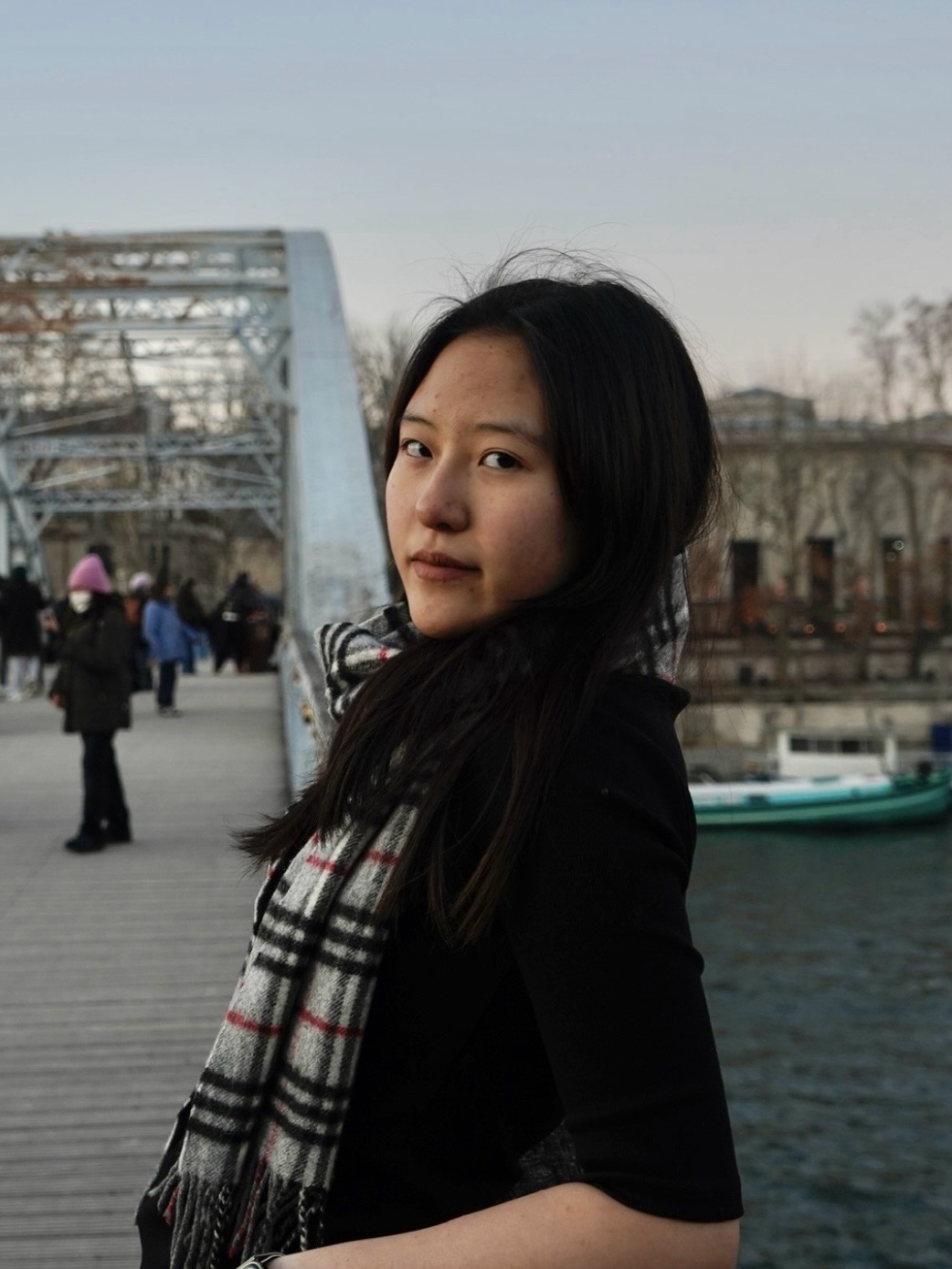 Miriam Guo photographed beside a canal